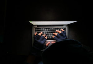 A hacker hand stealing wifi.